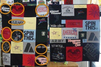 logos on a T-shirt quilt cropped off