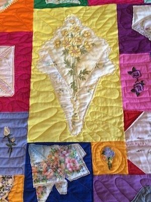 Example of how a hankie was folded and used in a quilt.