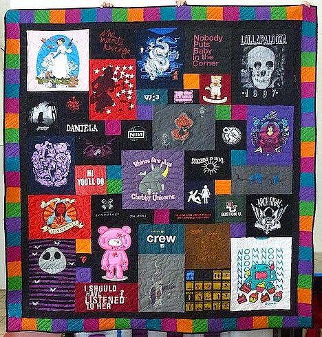 A T-shirt quilt with a Jewel Tone pieced border