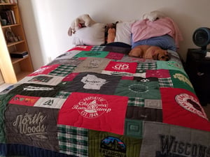 memory quilt on a bed