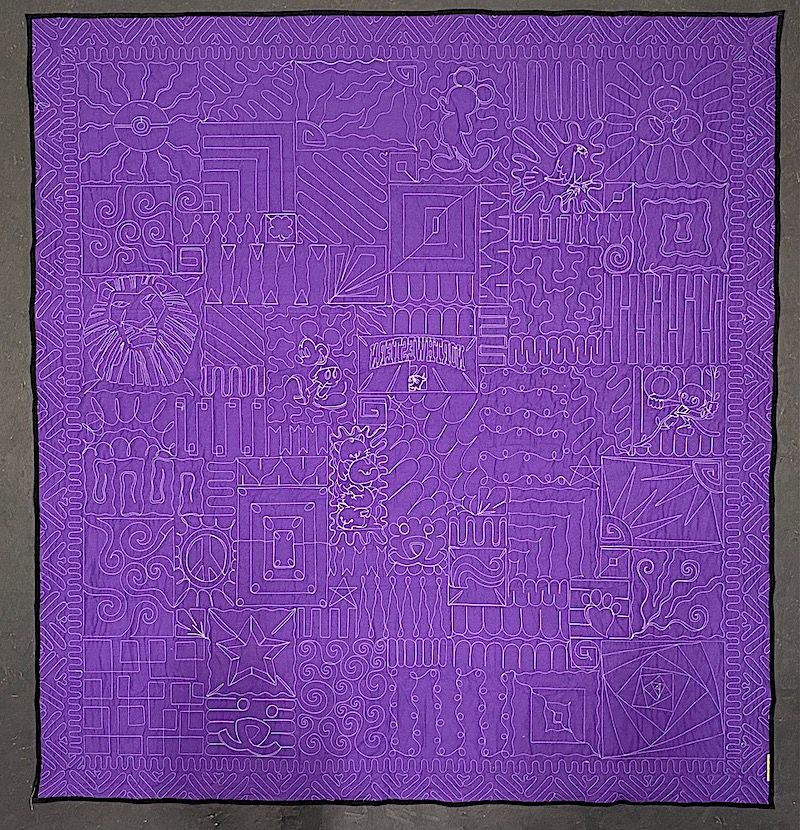 purple back of a Too Cool T-shirt Quilt