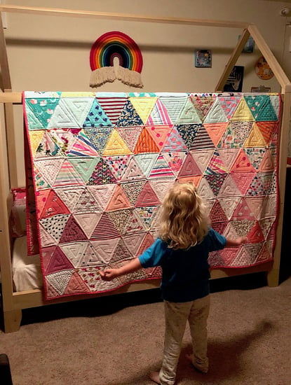 Triangle quilt with girl