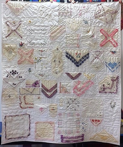 Hankie quilt on white background